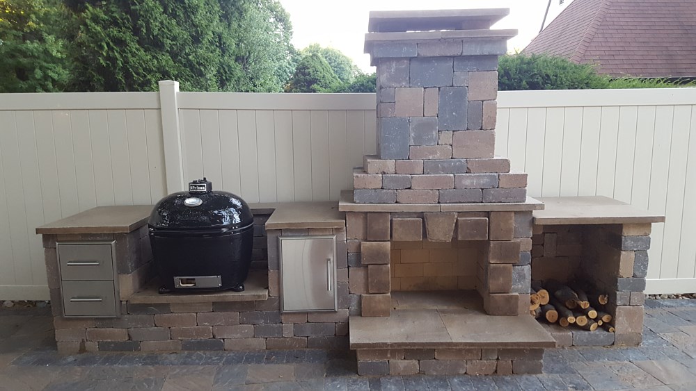 outdoor brick fireplace and grill